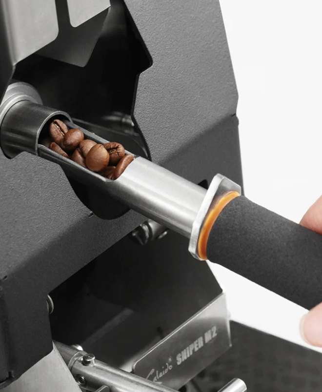 Loading roasted beans into the Kaleido Sniper M2 Dual Pro